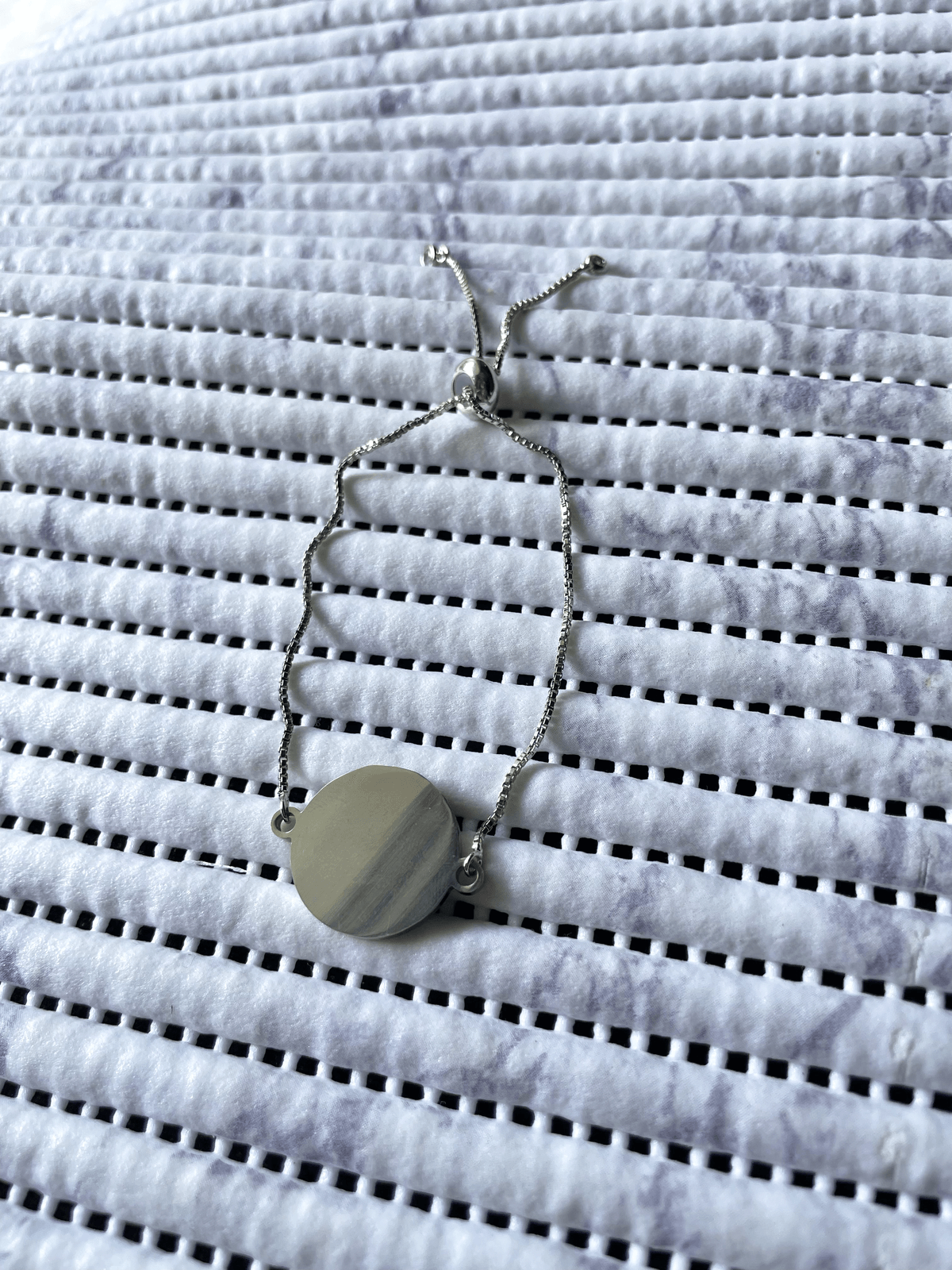 Pulsera medalla circular