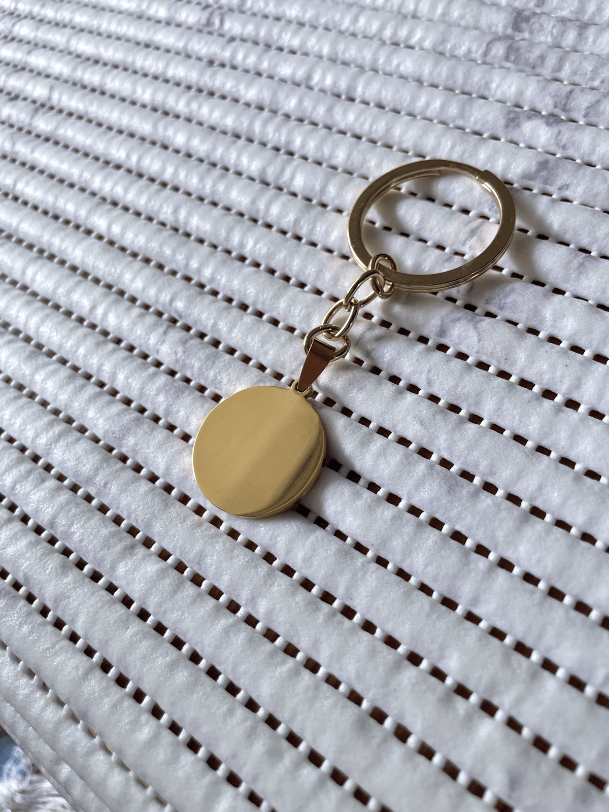 Llavero medalla circular