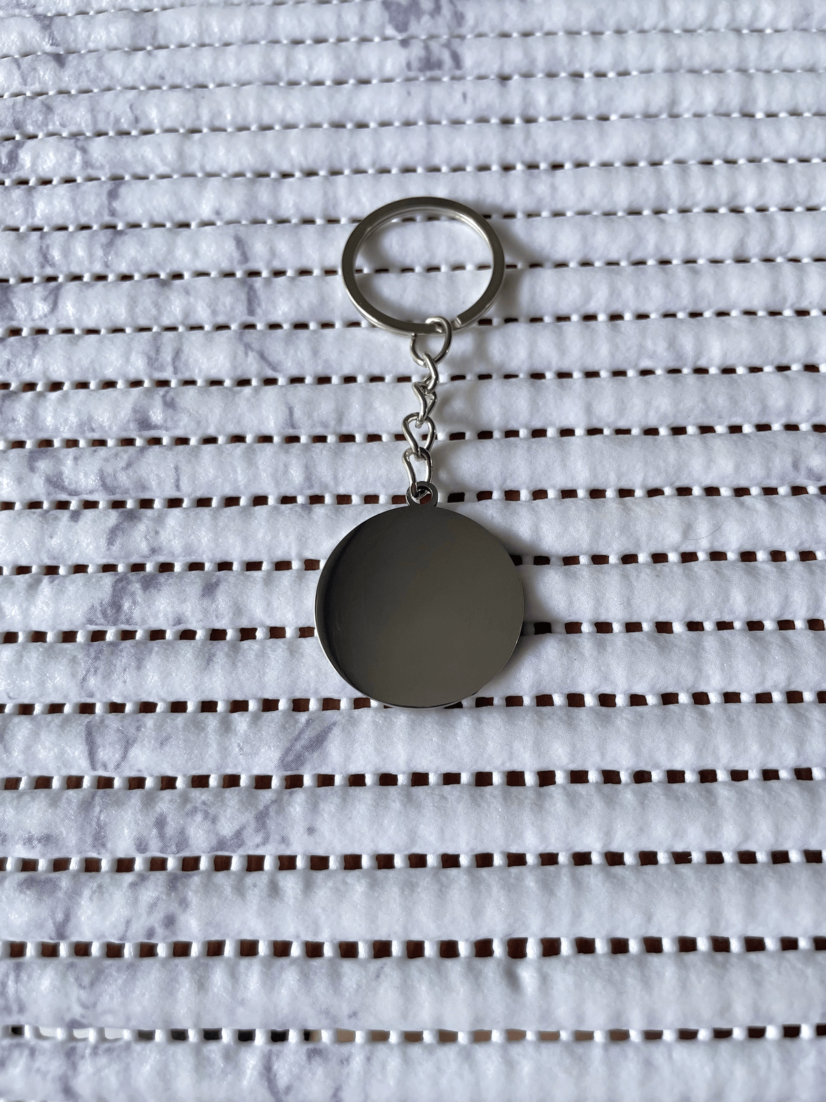 Llavero medalla circular